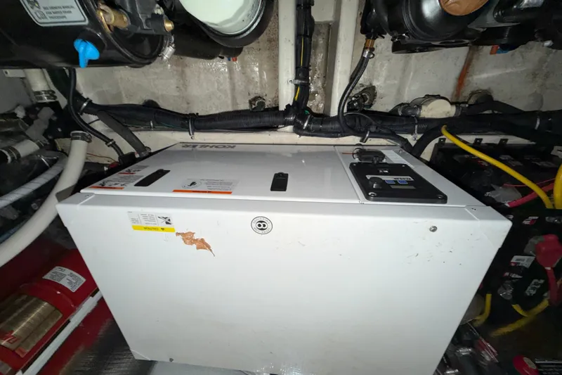 Slide: The Image of Engine room of 2018 Rinker EX 320 boat with Kohler generator. - 33