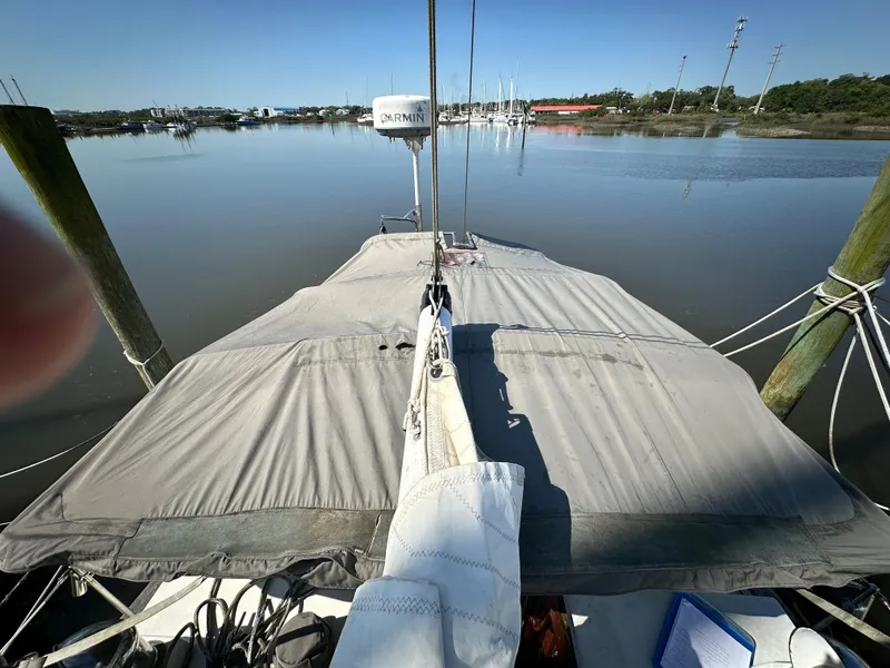 Slide: The Image of Sailboat docked on calm water, Pan Oceanic 43, 1982 model. - 6