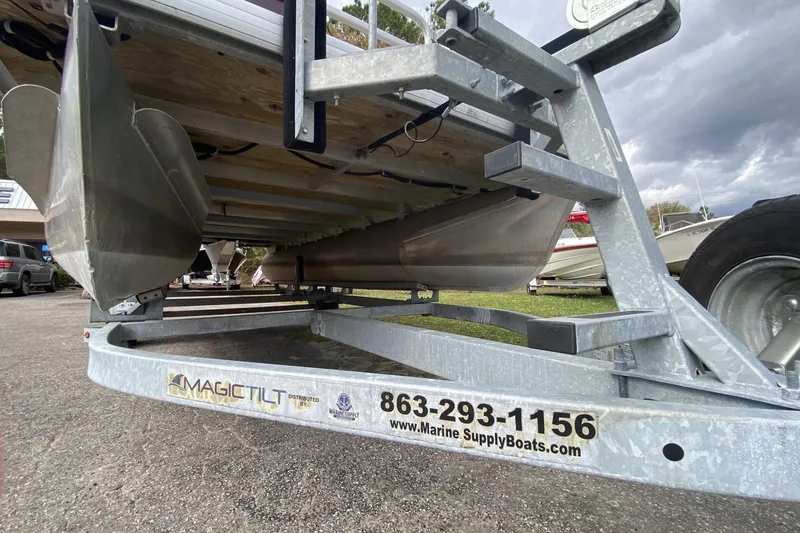 Slide: The Image of Trailer for 2020 Godfrey 180 SR boat, featuring Magic Tilt branding. - 12