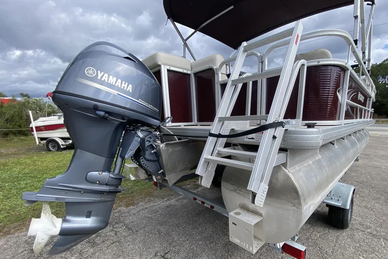 Slide: The Image of 2020 Godfrey 180 SR pontoon boat with Yamaha outboard motor and ladder. - 13
