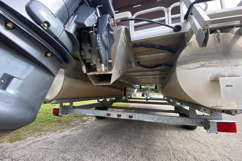 Slide: The Image of Underneath view of a 2020 Godfrey 180 SR pontoon boat on a trailer. - 14