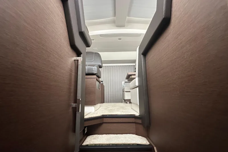 Slide: The Image of Interior view of 2020 Prestige 460 yacht with modern design and wooden finishes. - 28