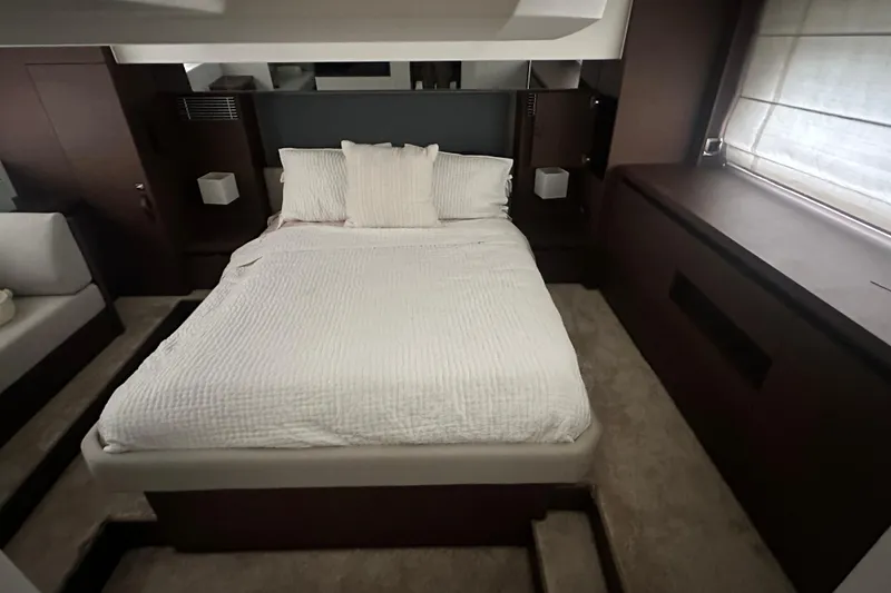 Slide: The Image of Luxurious bedroom interior of 2020 Prestige 460 yacht with elegant bedding and modern design. - 29
