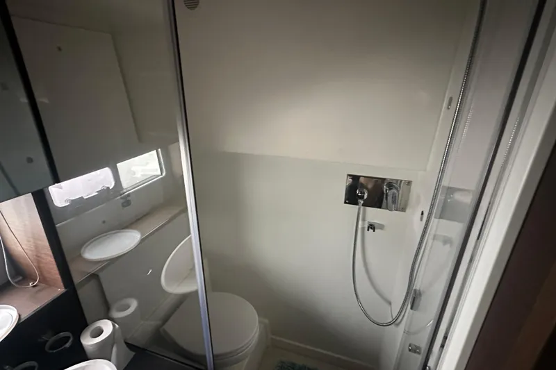 Slide: The Image of Modern bathroom in 2020 Prestige 460 yacht with shower and toilet. - 34