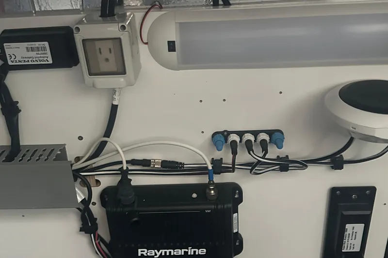 Slide: The Image of Electrical panel of a 2020 Prestige 460 yacht with Raymarine equipment and wiring. - 39