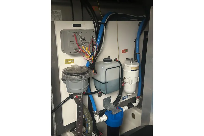 Slide: The Image of Engine compartment of a 2020 Prestige 460 yacht, showcasing wiring and fluid systems. - 41