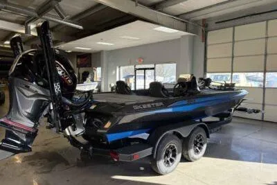 Slide: The Image of 2026 Skeeter ZXE21 boat in showroom, featuring sleek design and powerful engine. - 4