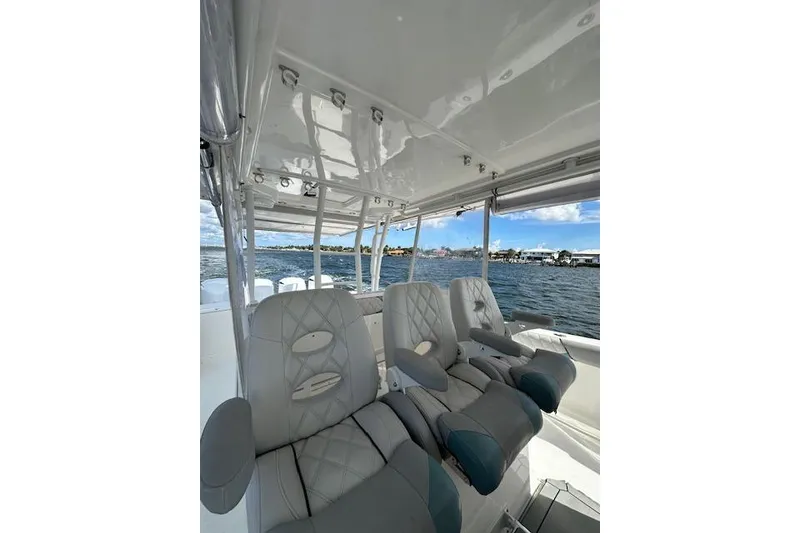 Slide: The Image of Interior view of 2016 Everglades 435 Center Console boat with luxurious seating. - 20