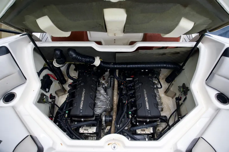 Slide: The Image of 2018 Yamaha Boats 212X engine compartment with dual high output engines. - 13