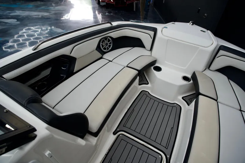 Slide: The Image of 2018 Yamaha Boats 212X interior with sleek seating and modern design. - 4