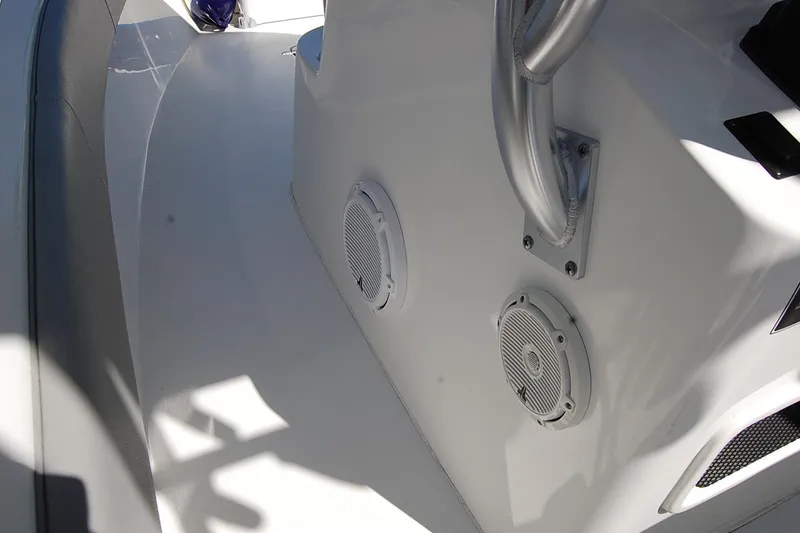 Slide: The Image of 2020 Cape Horn 31T boat interior with speakers and metal railing. - 16