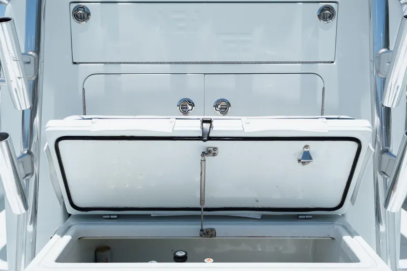 Slide: The Image of Open storage compartment on a 2017 SeaVee 390Z boat, showcasing interior details. - 23