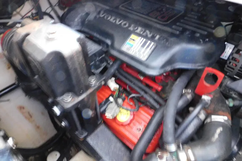 Slide: The Image of Engine compartment of a 2006 Monterey 302 Cruiser boat, featuring Volvo Penta components. - 15