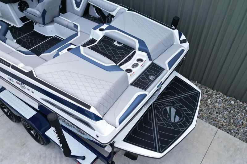Slide: The Image of 2019 Tigé ZX1 boat interior with sleek seating and modern design elements. - 11