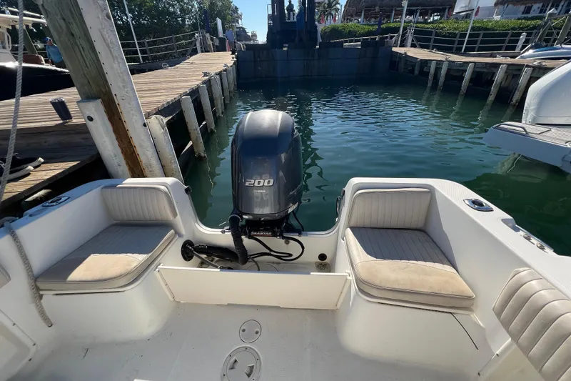 Slide: The Image of 2004 Hydra-Sports 212 CC boat with Yamaha 200 engine at dockside. - 10