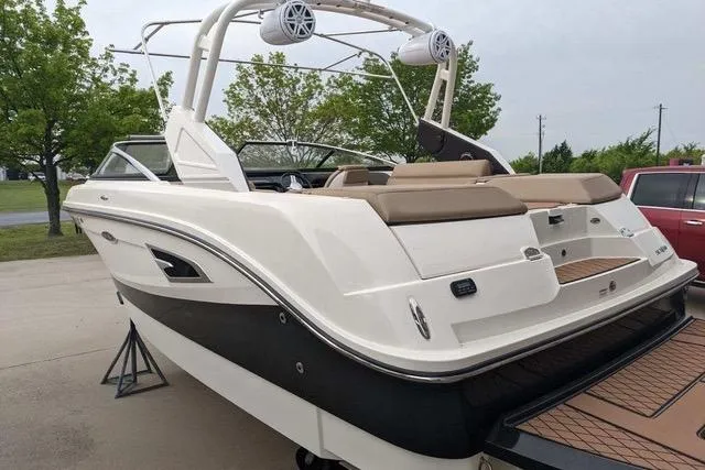 Slide: The Image of 2018 Sea Ray SLX-W 230 boat with sleek design and spacious seating. - 3