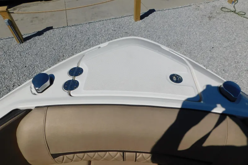 Slide: The Image of 2018 Sea Ray SLX-W 230 boat bow with beige seating and white deck. - 40