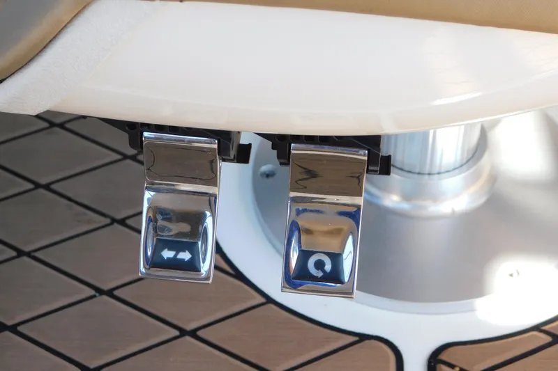 Slide: The Image of Pedals on 2018 Sea Ray SLX-W 230 boat, featuring sleek chrome design. - 53