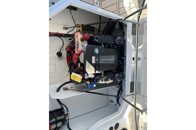Slide: The Image of 2025 Cobalt R6 boat engine compartment with Volvo Penta engine. - 14