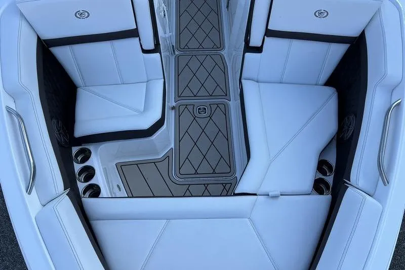 Slide: The Image of 2025 Cobalt R6 boat interior with white seating and sleek design. - 5