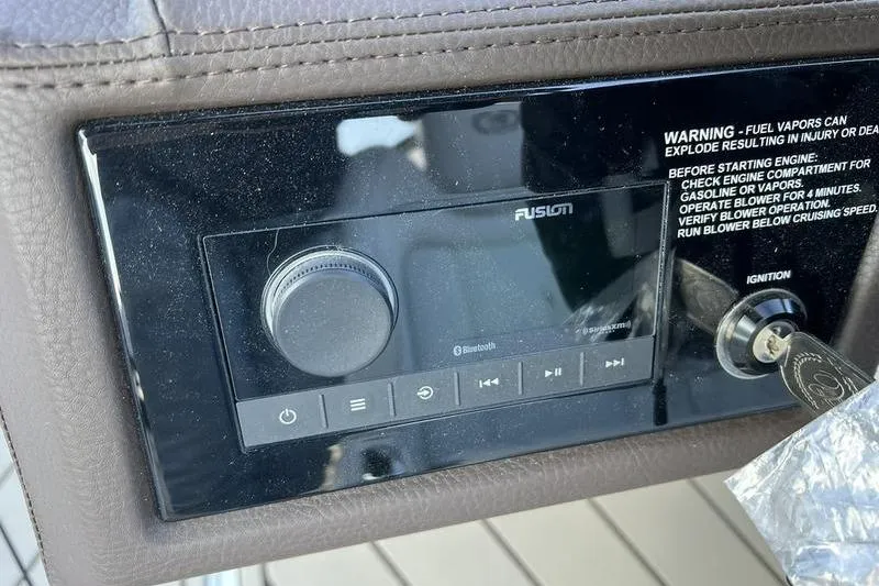 Slide: The Image of Control panel of a 2025 Cobalt R6 boat with ignition and audio system. - 9