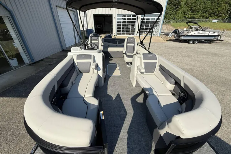 Slide: The Image of 2025 Barletta Cabrio 22UC pontoon boat with spacious seating and modern design. - 23