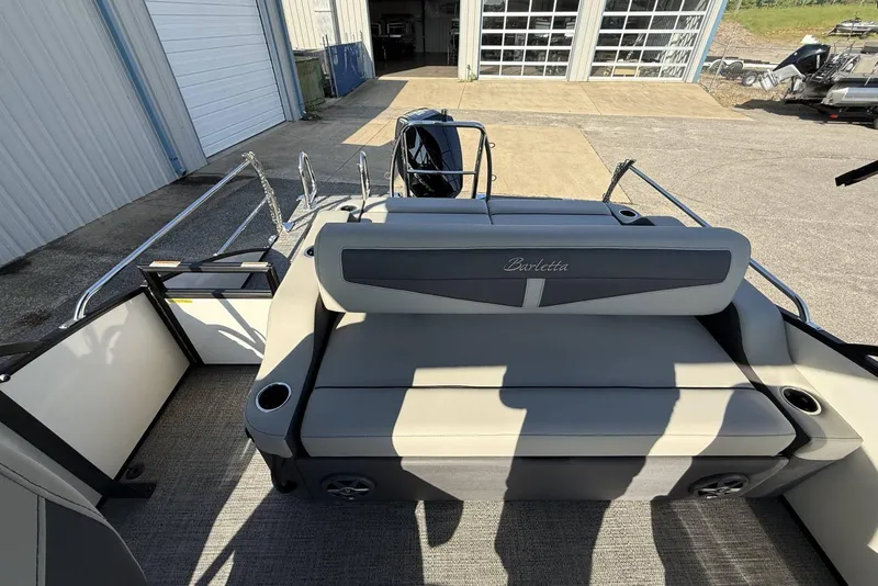 Slide: The Image of 2025 Barletta Cabrio 22UC pontoon boat with spacious seating and modern design. - 25