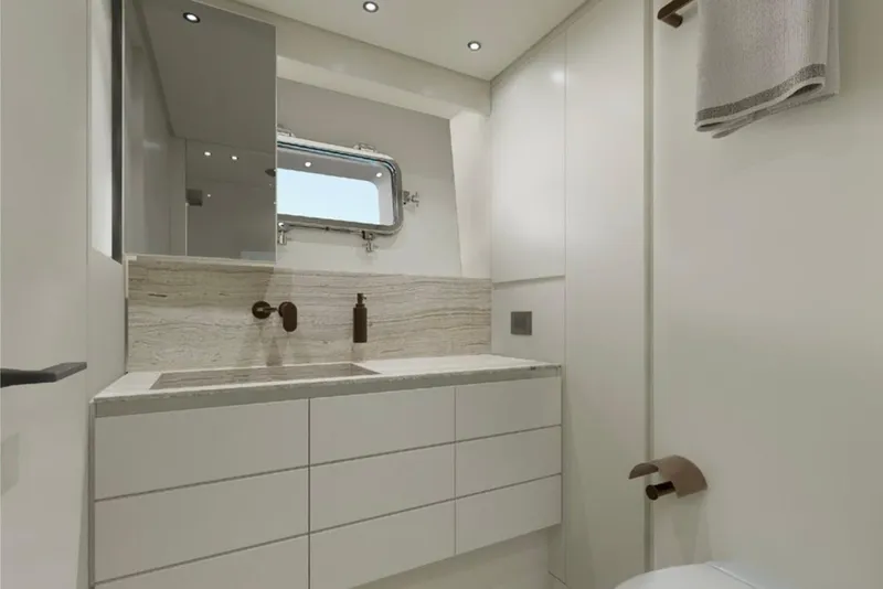 Slide: The Image of Modern bathroom interior on 2026 Sanlorenzo SP92 yacht, featuring sleek design and elegant fixtures. - 17