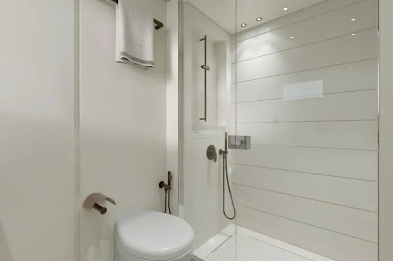 Slide: The Image of Modern bathroom in 2026 Sanlorenzo SP92 yacht with glass shower and sleek fixtures. - 18