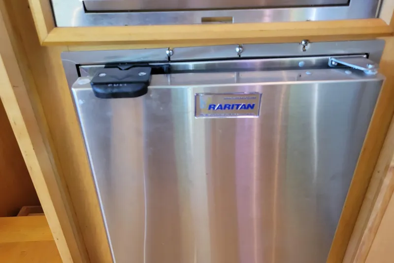 Slide: The Image of Stainless steel Raritan appliance on 1979 Bertram 38 Convertible yacht. - 18