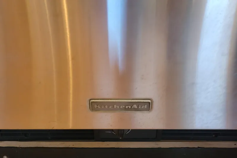Slide: The Image of Stainless steel KitchenAid appliance with visible brand logo. - 19