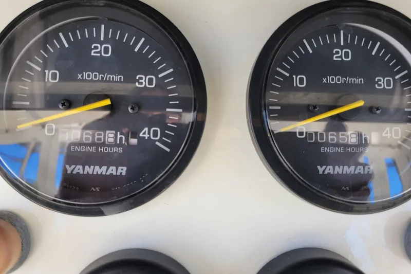 Slide: The Image of Close-up of Yanmar engine hour meters on a 1979 Bertram 38 Convertible boat. - 42