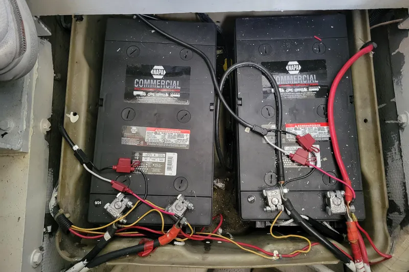 Slide: The Image of Battery compartment of a 1979 Bertram 38 Convertible with NAPA commercial batteries. - 58