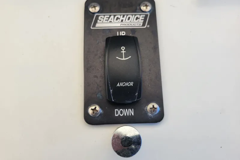 Slide: The Image of Seachoice anchor switch on 1979 Bertram 38 Convertible boat control panel. - 62
