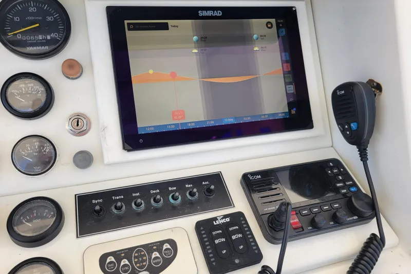 Slide: The Image of Control panel of a 1979 Bertram 38 Convertible boat with navigation equipment. - 72