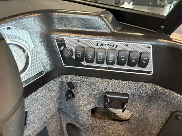 Slide: The Image of Dashboard of 2026 Lund 1875 Impact XS Sport with switches. - 12