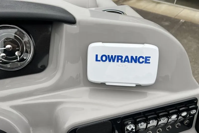 Slide: The Image of Dashboard of 2025 Barletta Aria 24UC with Lowrance device and gauges. - 13