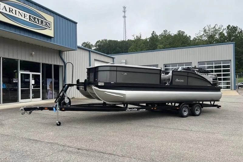 Slide: The Image of 2025 Barletta Aria 24UC pontoon boat on trailer at Marine Sales dealership. - 4
