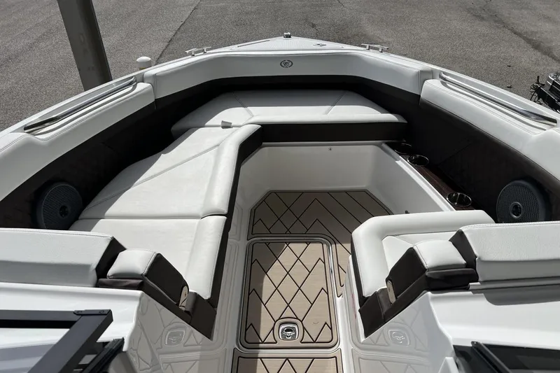 Slide: The Image of 2025 Cobalt R8 boat interior with luxurious seating and modern design. - 9