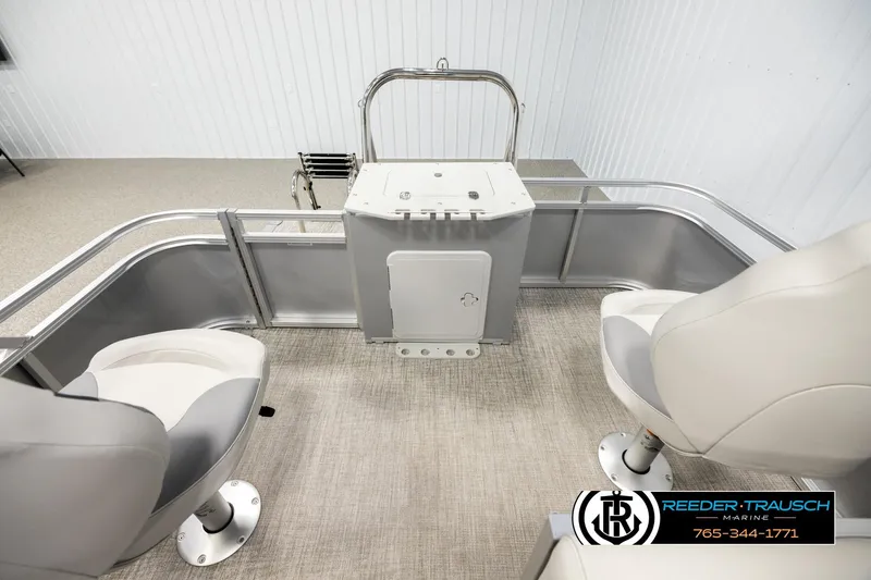 Slide: The Image of 2026 Avalon VEN RF boat interior with seating and storage, showcased by Reeder Trausch Marine. - 15