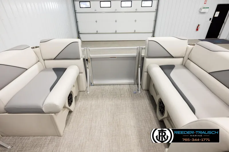 Slide: The Image of Luxurious interior of 2026 Avalon VEN RF boat with plush seating in a showroom. - 18