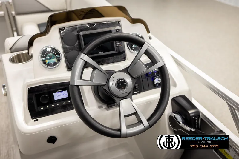 Slide: The Image of Steering console of 2026 Avalon VEN RF boat with modern controls and gauges. - 29