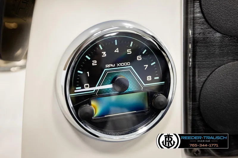 Slide: The Image of Tachometer of 2026 Avalon VEN RF boat, featuring RPM display, Reeder-Trausch Marine branding. - 32