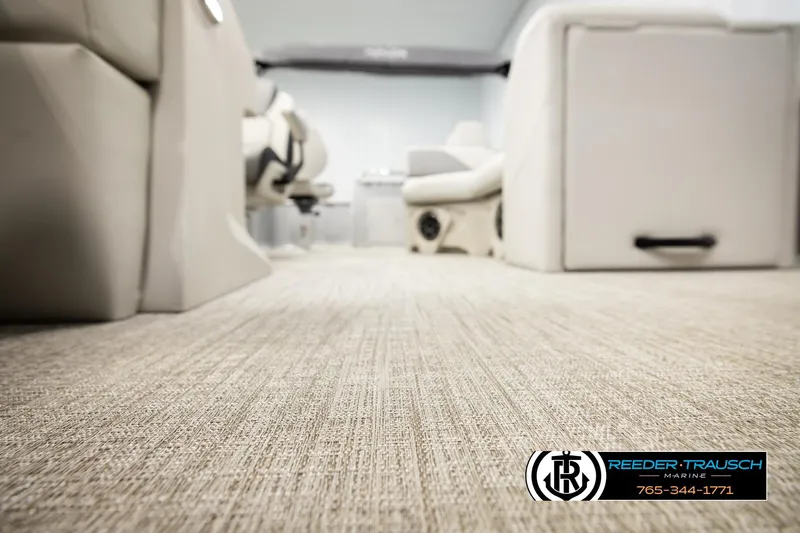 Slide: The Image of Luxurious interior of 2026 Avalon VEN RF boat with plush seating and carpet flooring. - 45
