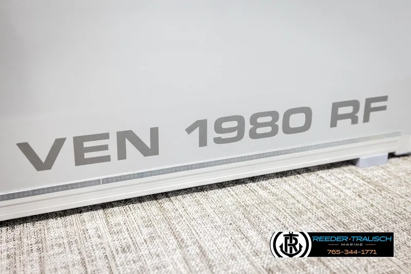 Slide: The Image of 2026 Avalon VEN RF boat detail with "VEN 1980 RF" text and Reeder-Trausch Marine logo. - 47