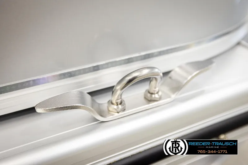 Slide: The Image of Close-up of a 2026 Avalon VEN RF boat cleat with Reeder-Trausch Marine logo. - 50