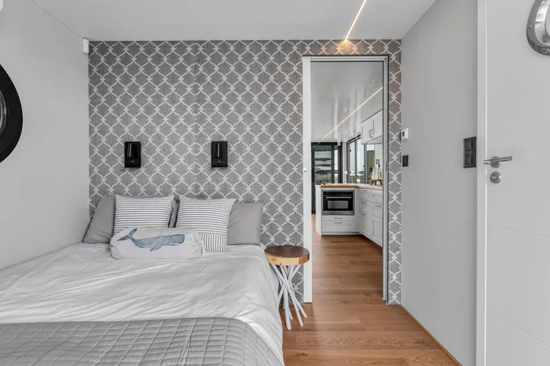 Slide: The Image of Modern Waterlodge Apart L Long 2026 interior with stylish bedroom and kitchen view. - 18