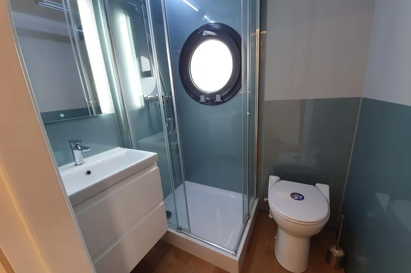 Slide: The Image of Modern bathroom in 2026 Waterlodge Apart L Long, featuring shower, sink, and toilet. - 29