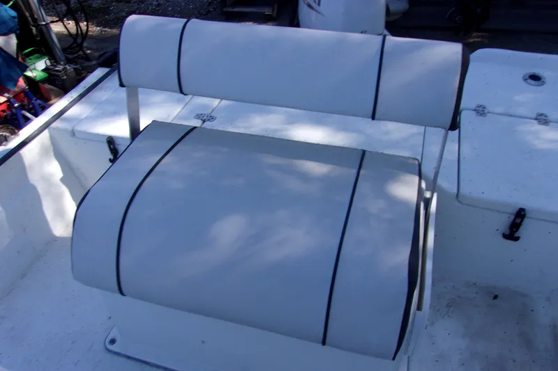 Slide: The Image of 2021 Clearwater Sport Fishing Cape Craft 166CC boat seat, white with black trim. - 10