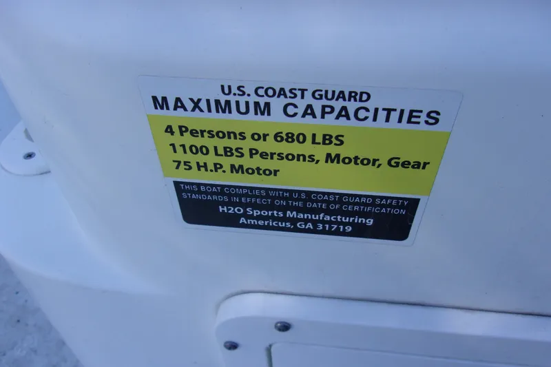 Slide: The Image of 2021 Clearwater Sport Fishing Cape Craft 166CC capacity label, 4 persons or 680 lbs, 75 HP motor. - 13